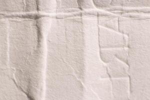 Crumpled White Paper Texture with Detailed Macro Background. photo