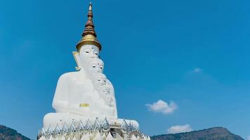 The big white Buddha five statue,Phetchabun is one of the top Thailand famous temples with a huge five white jade buddhas layered statue,Wat Phra That Pha Kaew, Phetchabun,Five white Buddha statue. video
