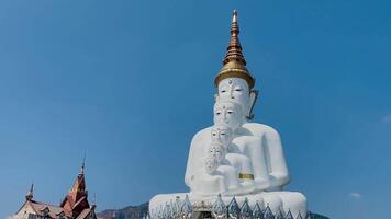 The big white Buddha five statue,Phetchabun is one of the top Thailand famous temples with a huge five white jade buddhas layered statue,Wat Phra That Pha Kaew, Phetchabun,Five white Buddha statue. video