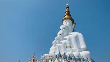 The big white Buddha five statue,Phetchabun is one of the top Thailand famous temples with a huge five white jade buddhas layered statue,Wat Phra That Pha Kaew, Phetchabun,Five white Buddha statue. video