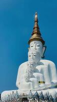 The big white Buddha five statue,Phetchabun is one of the top Thailand famous temples with a huge five white jade buddhas layered statue,Wat Phra That Pha Kaew, Phetchabun,Five white Buddha statue. video