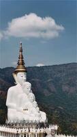 The big white Buddha five statue,Phetchabun is one of the top Thailand famous temples with a huge five white jade buddhas layered statue,Wat Phra That Pha Kaew, Phetchabun,Five white Buddha statue. video