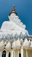 The big white Buddha five statue,Phetchabun is one of the top Thailand famous temples with a huge five white jade buddhas layered statue,Wat Phra That Pha Kaew, Phetchabun,Five white Buddha statue. video