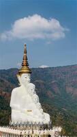 The big white Buddha five statue,Phetchabun is one of the top Thailand famous temples with a huge five white jade buddhas layered statue,Wat Phra That Pha Kaew, Phetchabun,Five white Buddha statue. video