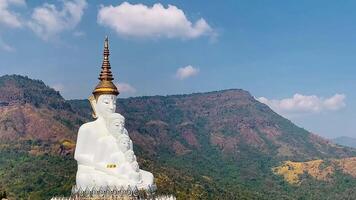 The big white Buddha five statue,Phetchabun is one of the top Thailand famous temples with a huge five white jade buddhas layered statue,Wat Phra That Pha Kaew, Phetchabun,Five white Buddha statue. video