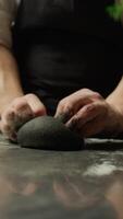 Hands Of A Chef Making The Black Ink Squid Dough At Restaurant Table video