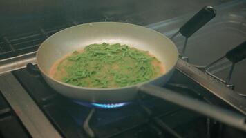 Tagliatelle Green Colored Pasta Cooking In The Pan Of A Restaurant video