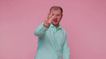 Countdown to holiday birthday celebration, happy man counting in reverse order from five to one, win video