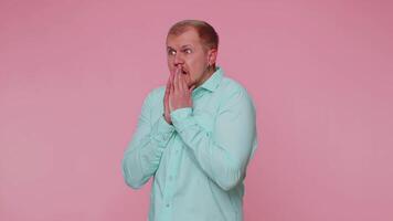 Man scared fearful, covering ears, meeting his own phobia, evidence horror event, screaming loud video