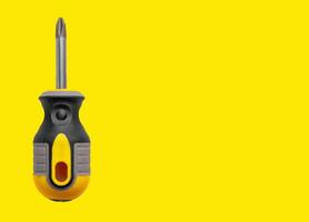 Screwdriver design in minimal background, metal tool and equipment object concept. Pink colorful photo