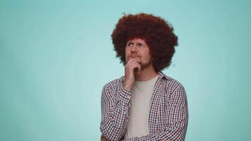 Doubting pensive man pondering and imagining in mind, wondering difficult solution, feeling confuse video