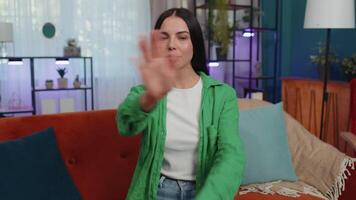 Angry woman say No hold palm folded crossed hands, warning of finish, Stop gesture, declining talk video