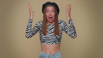 Excited amazed worried girl looking shocked surprised wow showing hands brain head explosion gesture video