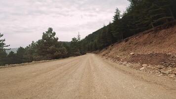 Car point of view emphasizes travel and adventure. Car point of view highlights beauty of mountainous terrain. Car point of view offers immersive travel experience. video