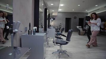 Barber Shop Experience. Client Interaction and Hair Preferences Discussion Before Coloring and Styling Session. High quality 4k footage video