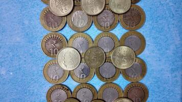 5 Rupee and 10 Rupee Indian Currency Coins - Slider Shot - Forwards video