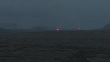 Aerial view of the latest eruption in Iceland on the May 29, 2024. Huge cracks and lava flows are visible from the distance. video