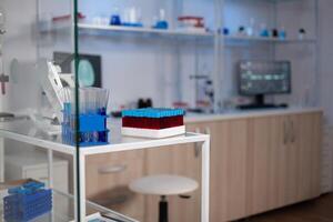 Empty medical neurological laboratory with nobody in it with professional modern equipment ready for neuroscience experiment. Lab with brain research on monitor. Medicine industry with high tech photo