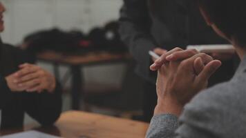 Financial analysts analyze business financial reports on a digital tablet planning investment project during a discussion at a meeting of corporate showing the results of their successful teamwork. video