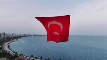 A close-up shot of the Turkish flag, showcasing the vibrant red color and the star and crescent symbol fluttering gracefully in the wind video