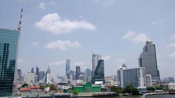 timelapse panorama landscape view of chaopraya river with river water boat transportation and background of bangkok ancient old city skyline with many temple along riverside video