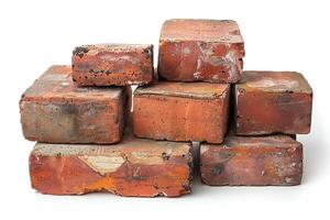 A pile of old broken bricks on a white background. Generated by artificial intelligence photo