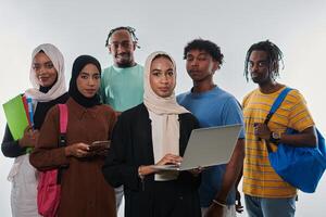 Group of diverse students engages in modern educational practices, utilizing a variety of technological tools such as laptops, tablets, and smartphones against a clean white background, exemplifying photo