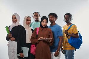 Group of diverse students engages in modern educational practices, utilizing a variety of technological tools such as laptops, tablets, and smartphones against a clean white background, exemplifying photo