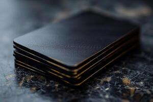 Stack of realistic black cards on a black marble surface. Blank template, card mockup. Generated by artificial intelligence photo