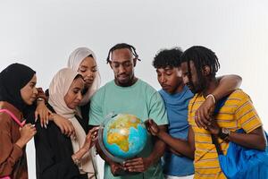 A diverse group of students is gathered around a globe, engrossed in exploration and study, their vibrant energy captured against a pristine white background, symbolizing unity and curiosity in their photo