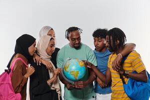 A diverse group of students is gathered around a globe, engrossed in exploration and study, their vibrant energy captured against a pristine white background, symbolizing unity and curiosity in their photo
