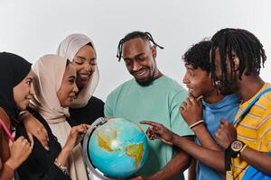 A diverse group of students is gathered around a globe, engrossed in exploration and study, their vibrant energy captured against a pristine white background, symbolizing unity and curiosity in their photo