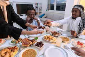 In a poignant close-up, the diverse hands of a Muslim family delicately grasp fresh dates, symbolizing the breaking of the fast during the holy month of Ramadan, capturing a moment of cultural unity photo