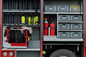 In this detailed close-up, a high-tech rescue tool, meticulously organized within state-of-the-art firefighting vehicles, showcases precision and innovation in life-saving equipment, emphasizing the photo