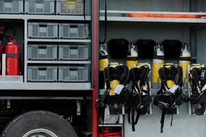 In this detailed close-up, a high-tech rescue tool, meticulously organized within state-of-the-art firefighting vehicles, showcases precision and innovation in life-saving equipment, emphasizing the photo