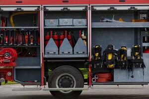 In this captivating scene, a state-of-the-art firetruck, equipped with advanced rescue technology, stands ready with its skilled firefighting team, prepared to intervene and respond rapidly to photo