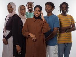 A diverse group of teenagers strikes dynamic poses with smiles and individual styles against a clean white backdrop, portraying the energetic spirit, unity, and varied personalities of modern youth photo