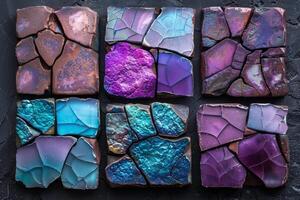 A collection of colorful glass pieces, each with a unique design and pattern photo