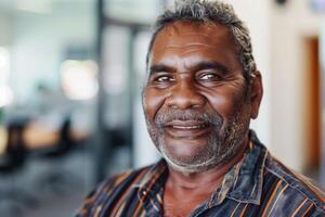 Elderly Man Smiling In Modern Office photo