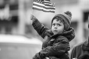 Little Boy Holding American Flag photo