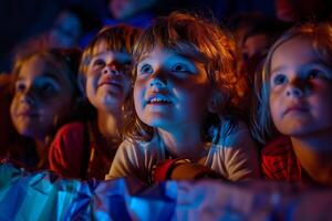 Children Watching Movie In Excitement photo