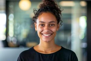 Young Woman Smiling In Modern Office photo