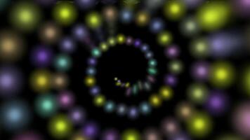 a circular pattern of colored lights is shown on a black background video