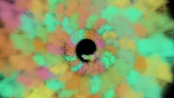 a colorful vortex is shown in a black background video