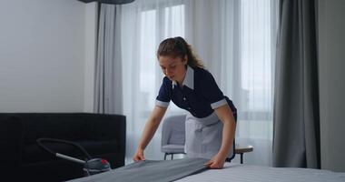 Young Adult Caucasian Maid Making Bed In Hotel Room, Profession And Occupational In Tourism video