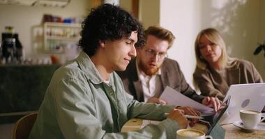 IT Professional And Businessman Discussing New Design Project And Idea Of Modern Software in Cafe video