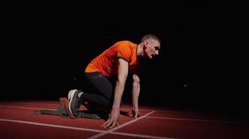 Professional Sportsman On Start Of Run Track In Stadium, Sprinter Runner Preparing To Run video
