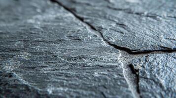 Close-Up Textured Slate Tile Surface with Natural Stone Patterns - High-Resolution Background for Design Projects photo
