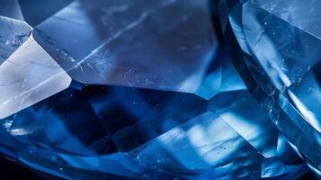 Close-Up of Polished Sapphire Gemstone with Smooth Textures and Deep Blue Hues for Jewel Analysis or Artistic Prints photo