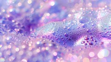 Iridescent frothy soap close-up texture with sparkling bubbles in lavender and pink hues for backgrounds and product design photo